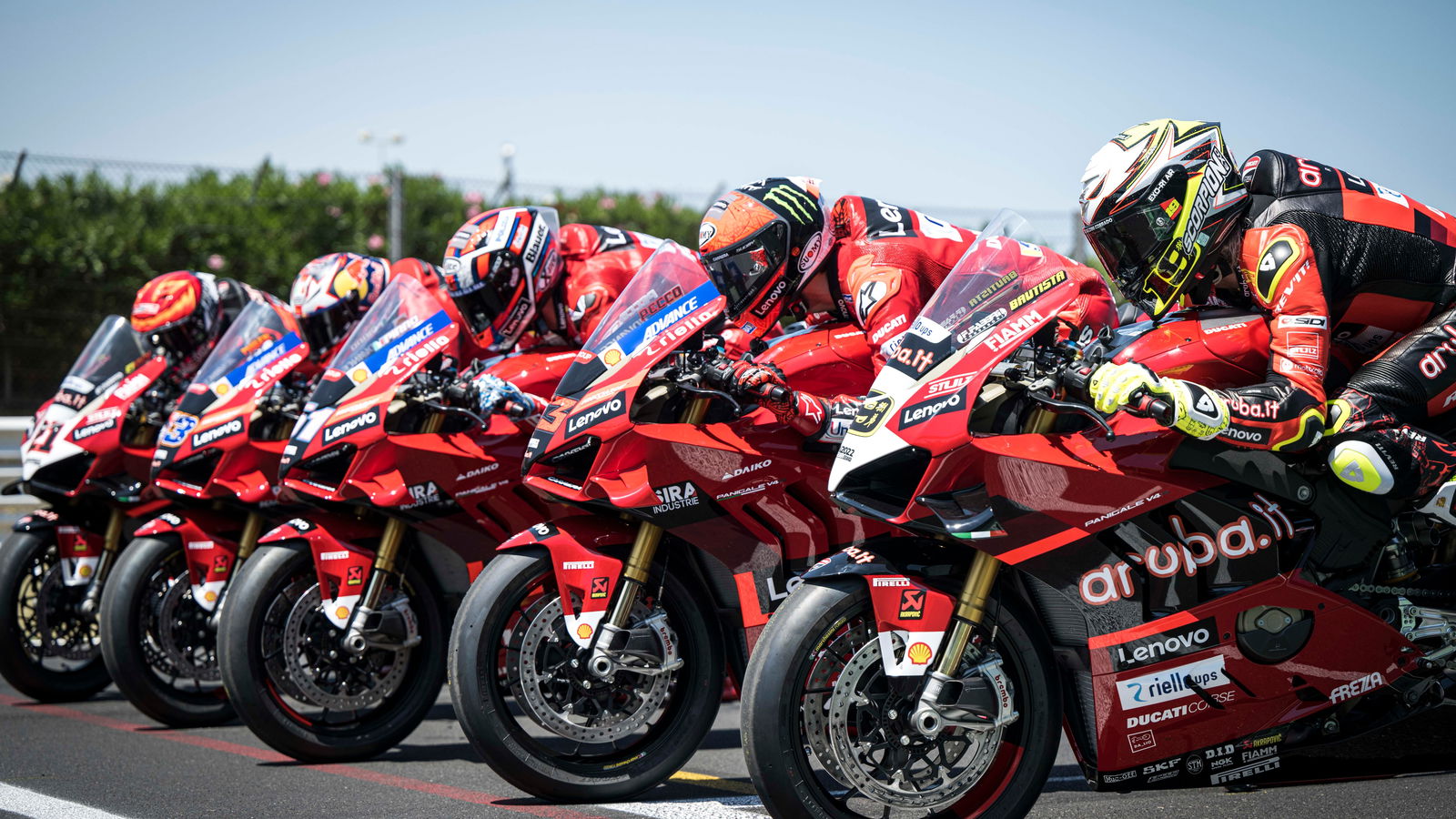 Ducati Race of Champions Panigale V4 S bikes lined up.